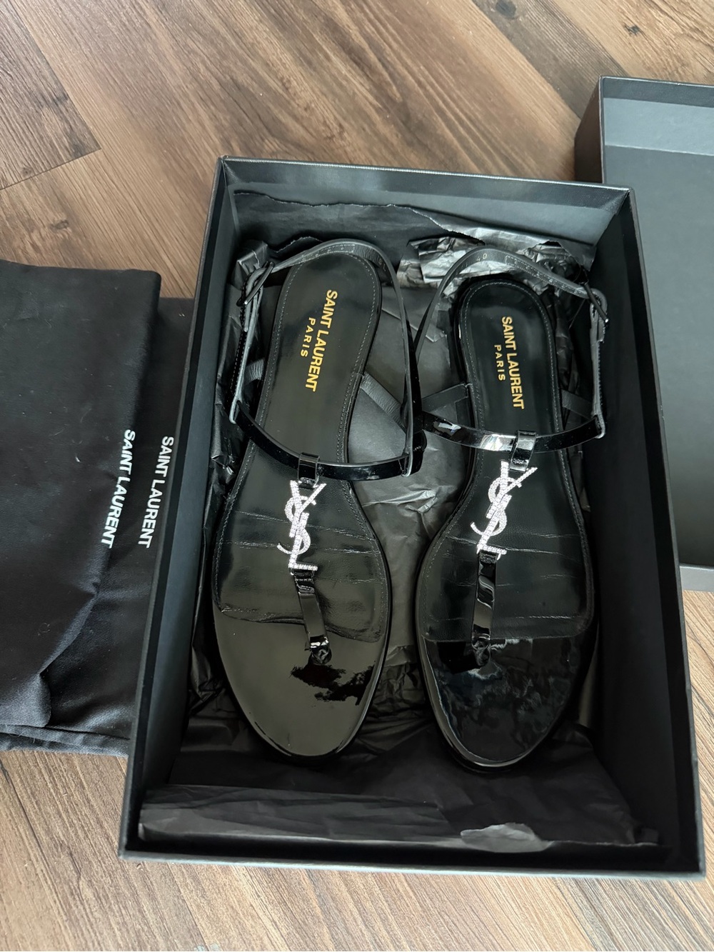 Saint Laurent Black Patent T-Strap Sandals with Silver YSL Logo